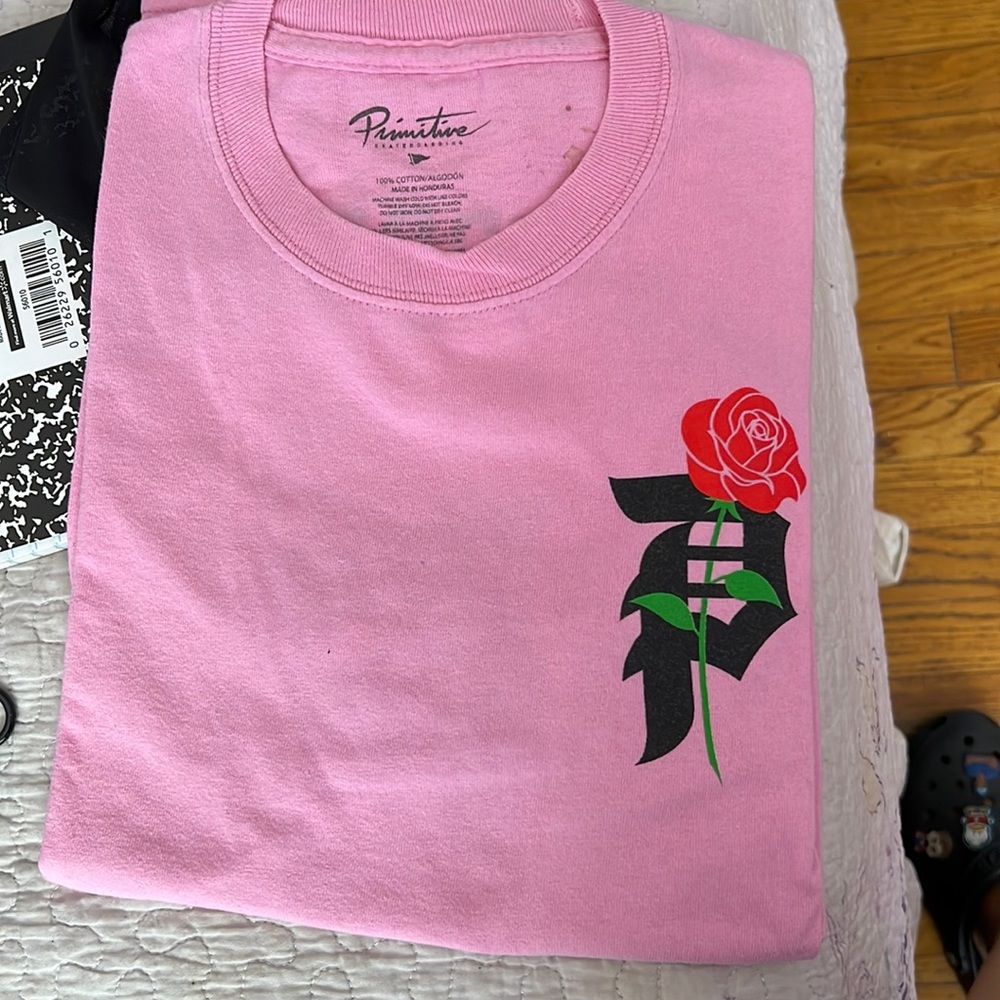 it’s a primitive shirt for kids size LARGE